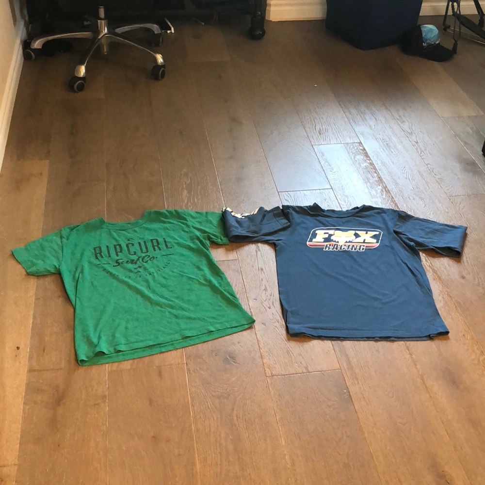 one long sleeved shirt and one short sleeved shirt